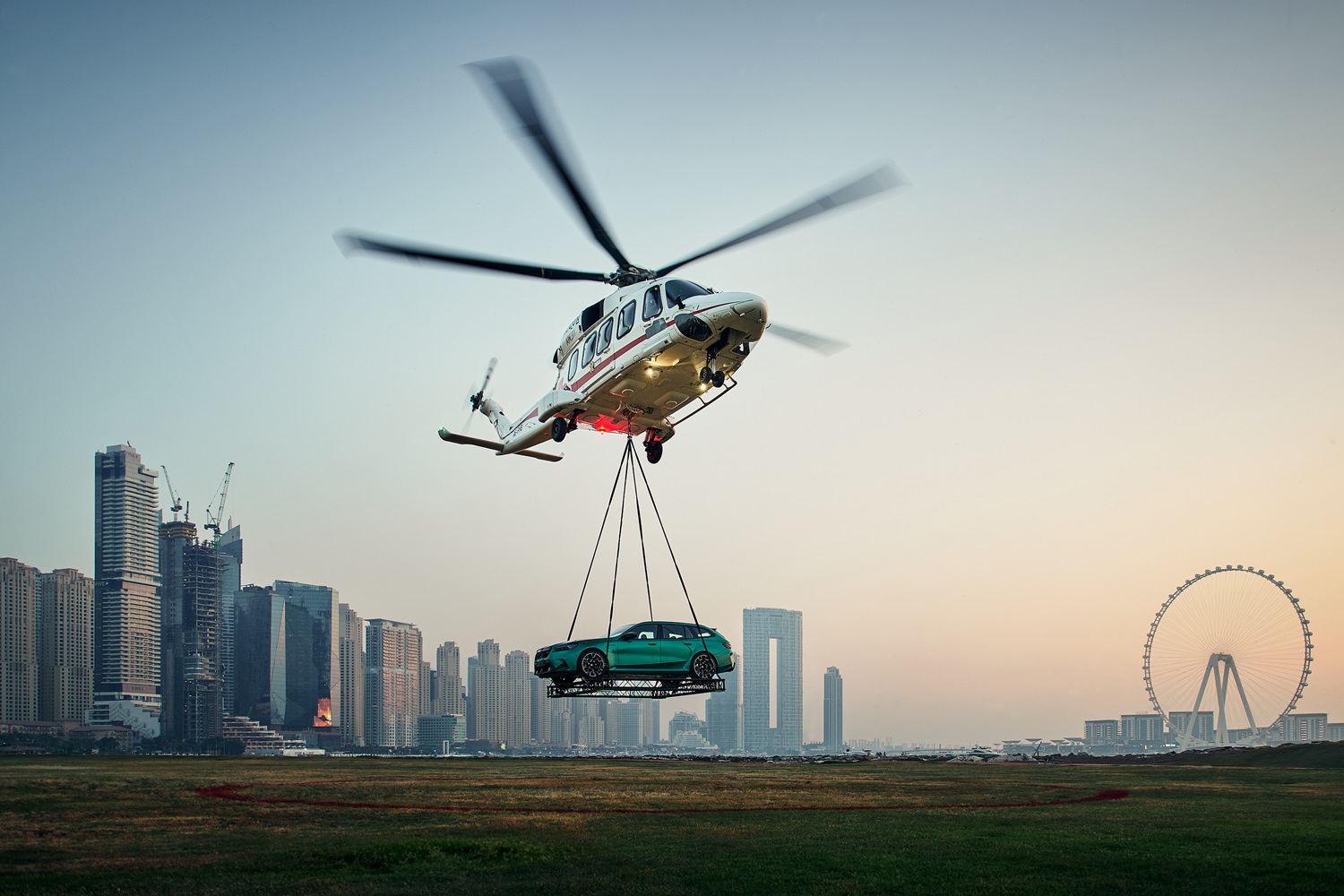 Image for In An Adrenalin-Charged Event: AGMC Unveils High-Performance BMW M5 And M5 Touring In Dubai With Helicopter Launch Stunt