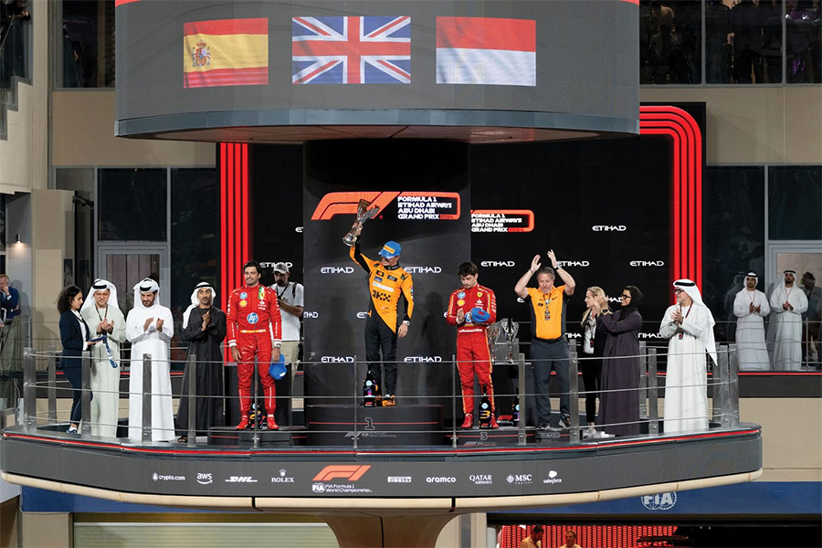 Image for Hamdan Bin Mohamed Bin Zayed Presents Lando Norris With Formula 1 Etihad Airways Abu Dhabi Grand Prix Winner’s Trophy